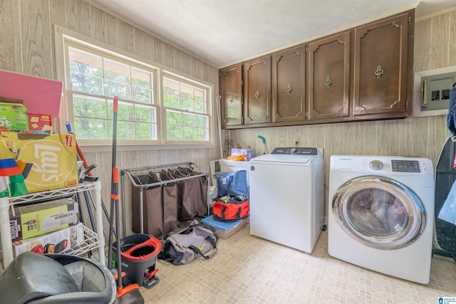 1111 Creek Trl, Anniston, AL 36206 - clothes washing area with cabinet space, light floors, separate washer and dryer, and wooden walls