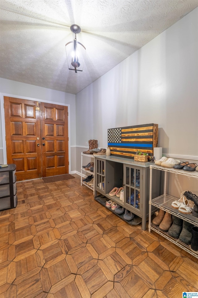 1111 Creek Trl, Anniston, AL 36206 - entryway with a textured ceiling and baseboards