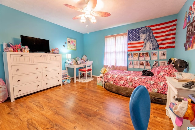 1111 Creek Trl, Anniston, AL 36206 - bedroom with wood finished floors and a ceiling fan