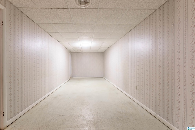 1111 Creek Trl, Anniston, AL 36206 - finished below grade area with a paneled ceiling, baseboards, and wallpapered walls