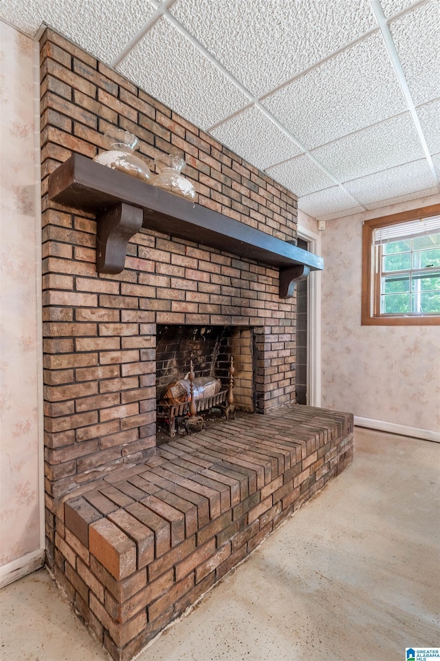 1111 Creek Trl, Anniston, AL 36206 - details with baseboards and a brick fireplace
