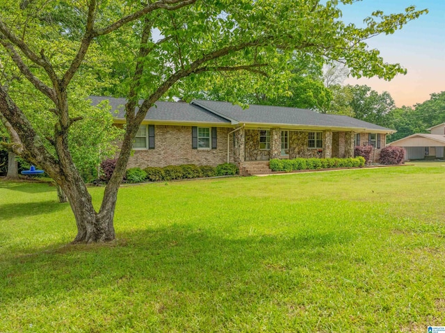 1111 Creek Trl, Anniston, AL 36206 - ranch-style home featuring a front lawn and brick siding