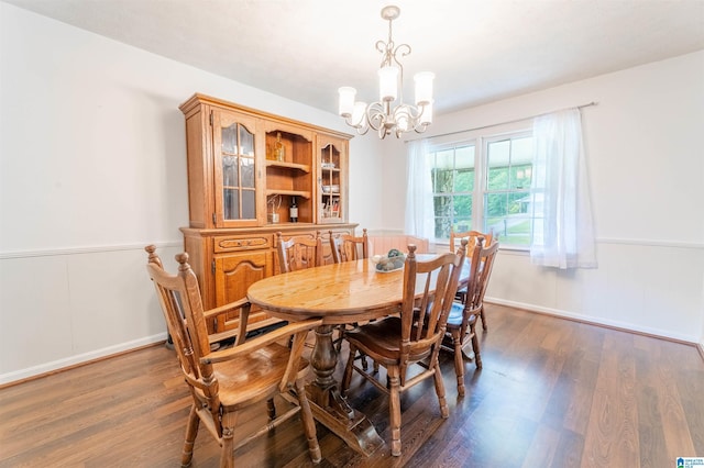 1111 Creek Trl, Anniston, AL 36206 - dining area featuring a notable chandelier, baseboards, and wood finished floors