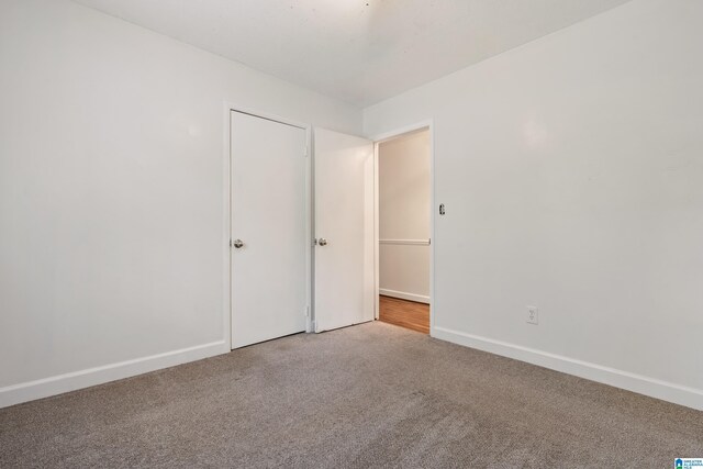 816 8th Cir N, Pell City, AL 35125 - unfurnished bedroom with carpet flooring and baseboards