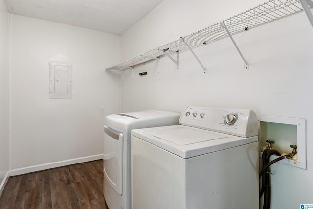 816 8th Cir N, Pell City, AL 35125 - washroom featuring washer and dryer, electric panel, wood finished floors, and baseboards