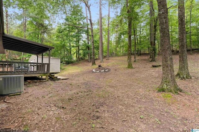 816 8th Cir N, Pell City, AL 35125 - view of yard with central AC and a deck
