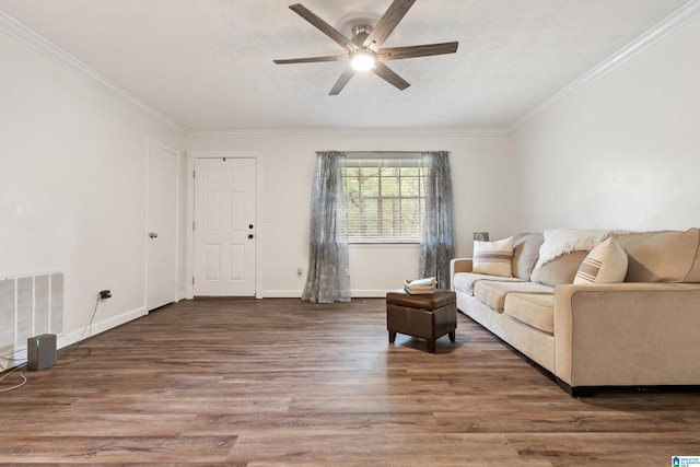 816 8th Cir N, Pell City, AL 35125 - living area with ceiling fan, wood finished floors, crown molding, and baseboards
