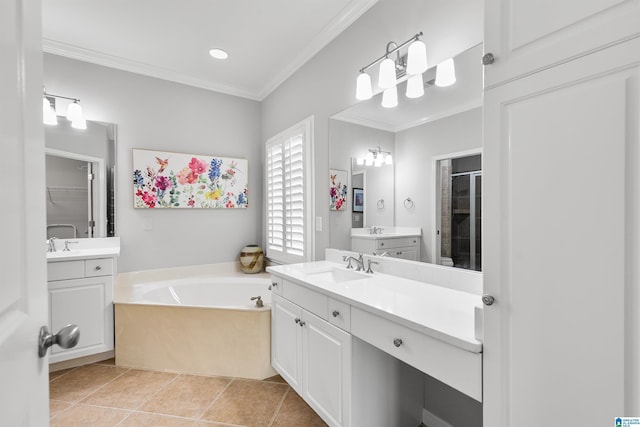 full bathroom featuring crown molding, tile patterned floors, a garden tub, a stall shower, and two vanities