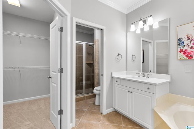 full bathroom featuring a stall shower, ornamental molding, baseboards, vanity, and tile patterned floors