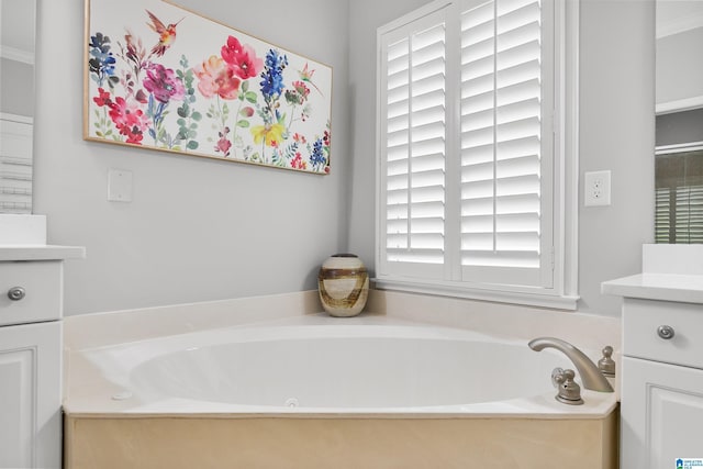full bath featuring vanity and a bath