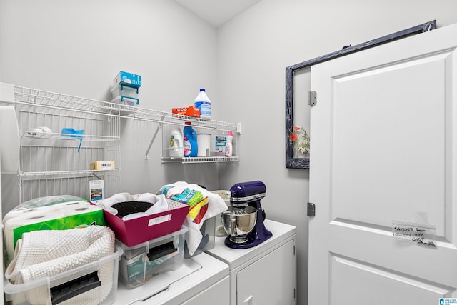 laundry area with separate washer and dryer