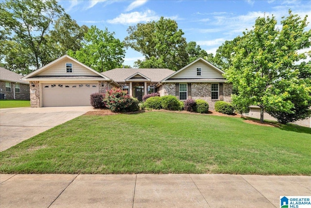 1004 Hidden Forest Dr, Montevallo, AL 35115 - view of front of home with a front lawn, driveway, brick siding, and a garage