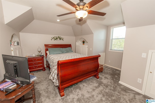 carpeted bedroom with baseboards, lofted ceiling, and ceiling fan