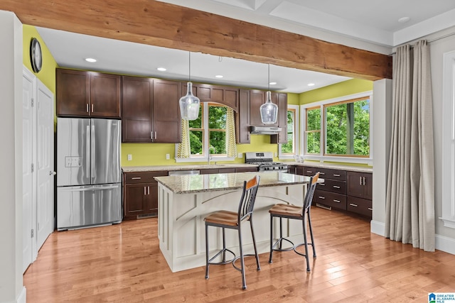 825 Dogwood Ln, Ashville, AL 35953 - kitchen with stainless steel appliances, dark brown cabinetry, and plenty of natural light