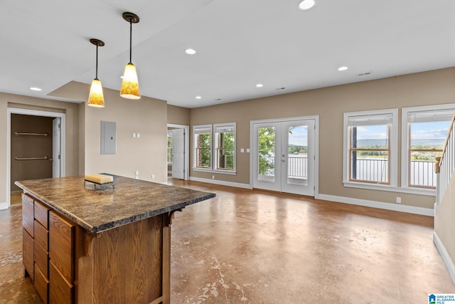 825 Dogwood Ln, Ashville, AL 35953 - kitchen featuring baseboards, dark countertops, recessed lighting, and a center island