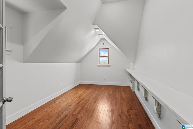 825 Dogwood Ln, Ashville, AL 35953 - bonus room featuring baseboards, wood-type flooring, and vaulted ceiling