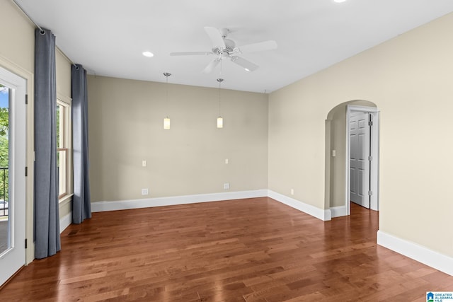 825 Dogwood Ln, Ashville, AL 35953 - empty room featuring wood finished floors, a ceiling fan, baseboards, arched walkways, and recessed lighting