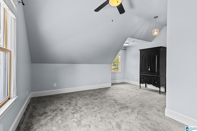 825 Dogwood Ln, Ashville, AL 35953 - additional living space with lofted ceiling, carpet, a ceiling fan, and baseboards