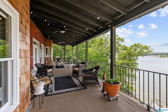 825 Dogwood Ln, Ashville, AL 35953 - view of patio / terrace featuring a water view, a balcony, and a ceiling fan
