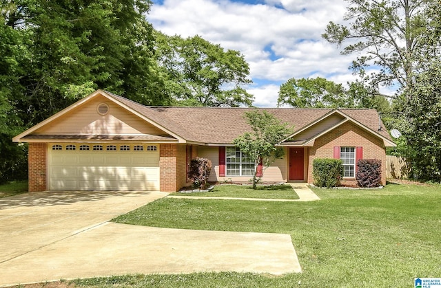 single story home featuring driveway, brick siding, an attached garage, a front yard, and roof with shingles