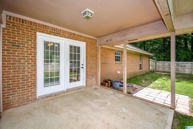 view of patio featuring fence
