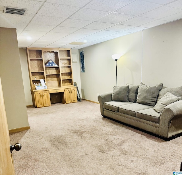 3043 Hunters Run, Gardendale, AL 35071 - living area featuring light colored carpet, baseboards, and built in features