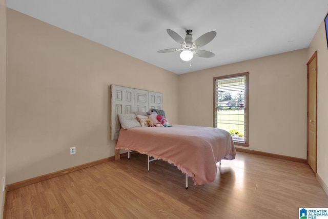 3043 Hunters Run, Gardendale, AL 35071 - bedroom with light wood-style flooring, baseboards, and ceiling fan