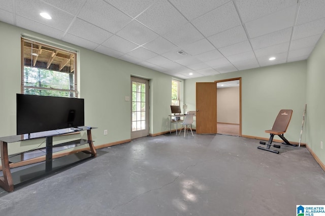 3043 Hunters Run, Gardendale, AL 35071 - unfurnished room with baseboards, finished concrete flooring, a paneled ceiling, and recessed lighting