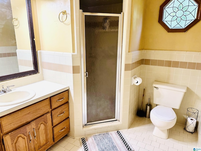 3043 Hunters Run, Gardendale, AL 35071 - full bath with tile walls, vanity, tile patterned flooring, toilet, and a shower stall