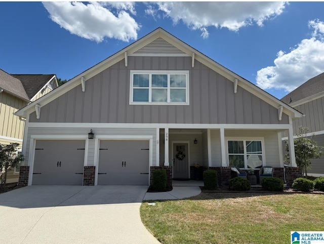 298 Appleford Rd, Helena, AL 35080 - craftsman inspired home featuring board and batten siding, concrete driveway, a porch, a front yard, and brick siding