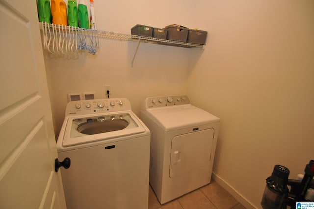 298 Appleford Rd, Helena, AL 35080 - washroom with separate washer and dryer, light tile patterned floors, and baseboards