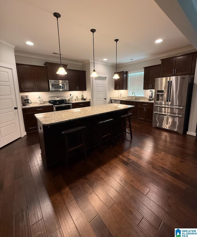 298 Appleford Rd, Helena, AL 35080 - kitchen featuring stainless steel appliances, a sink, a center island, dark brown cabinets, and crown molding