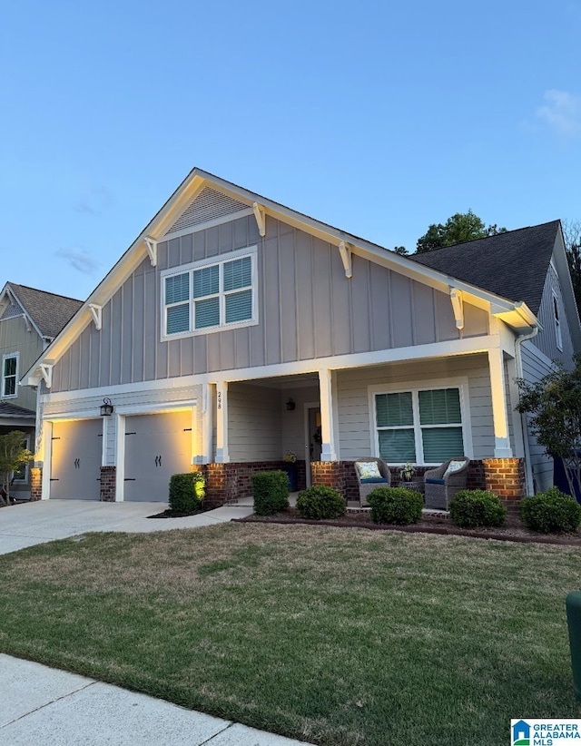 298 Appleford Rd, Helena, AL 35080 - craftsman inspired home with board and batten siding, concrete driveway, a front lawn, a porch, and brick siding