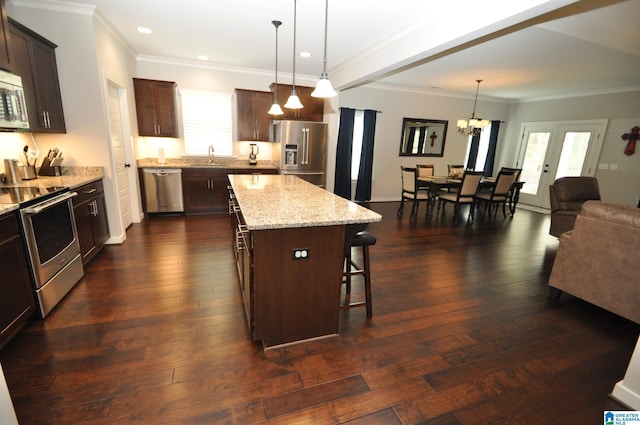 298 Appleford Rd, Helena, AL 35080 - kitchen featuring stainless steel appliances, a sink, a breakfast bar, open floor plan, and plenty of natural light