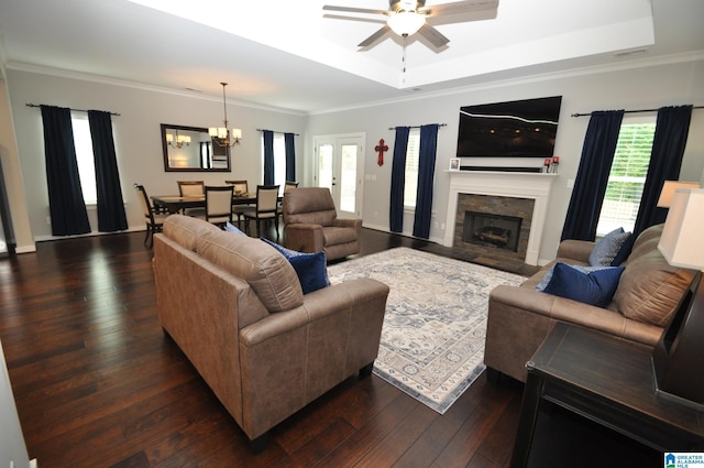 298 Appleford Rd, Helena, AL 35080 - living area with dark wood-style flooring, a ceiling fan, crown molding, a chandelier, and a raised ceiling