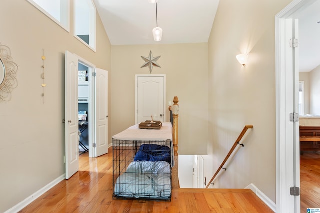 2616 Chimney Hills Cir, Vestavia Hills, AL 35226 - hallway featuring an upstairs landing, light wood-style flooring, and baseboards