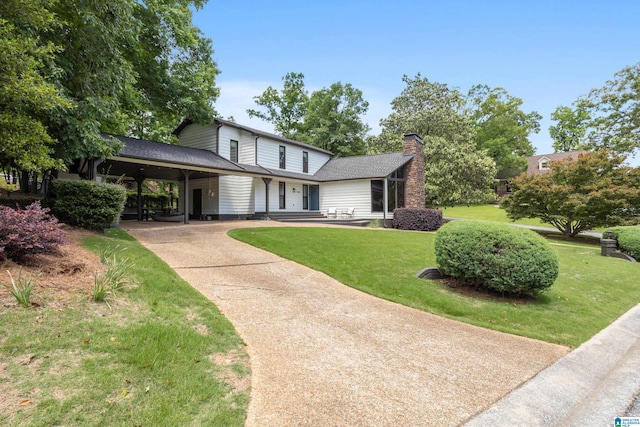 2616 Chimney Hills Cir, Vestavia Hills, AL 35226 - view of front of house with a front lawn and a chimney