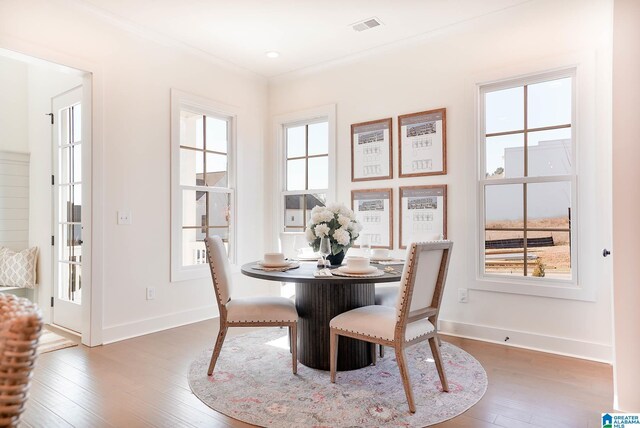 0571 Preserve Pkwy, Hoover, AL 35226 - dining area with wood-type flooring, baseboards, and ornamental molding