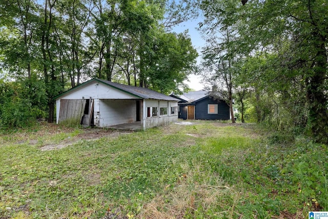 408 5th Pl, Birmingham, AL 35214 - rear view of house with a carport