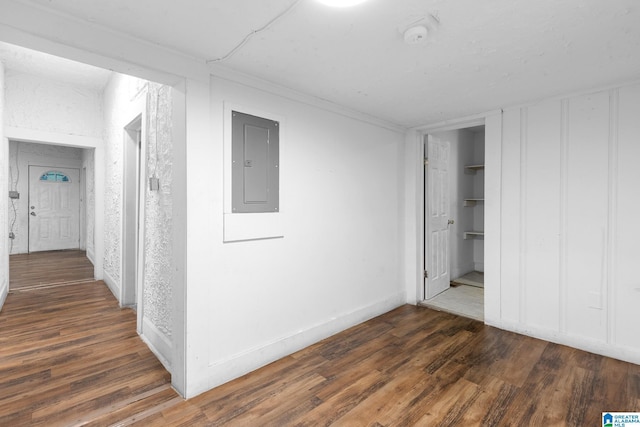 408 5th Pl, Birmingham, AL 35214 - corridor featuring electric panel, wood finished floors, ornamental molding, and baseboards