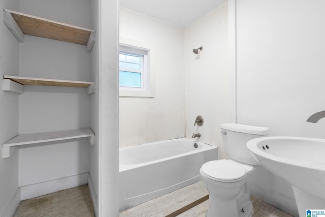 408 5th Pl, Birmingham, AL 35214 - bathroom featuring toilet and bathtub / shower combination