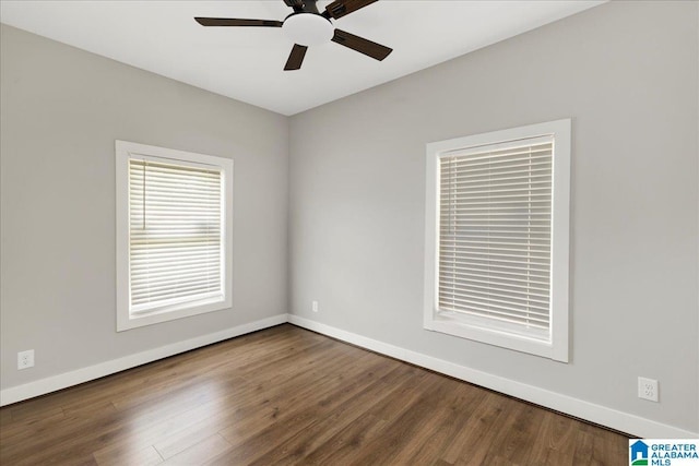 2624 29th St, Birmingham, AL 35208 - unfurnished room featuring a ceiling fan, baseboards, and wood finished floors