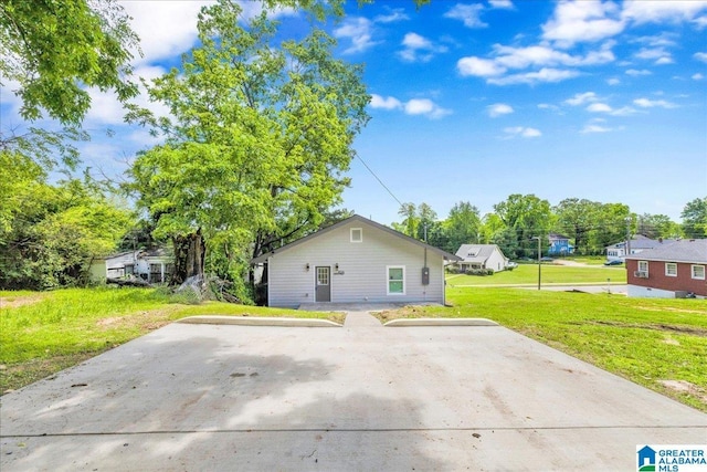 2624 29th St, Birmingham, AL 35208 - rear view of house featuring a lawn
