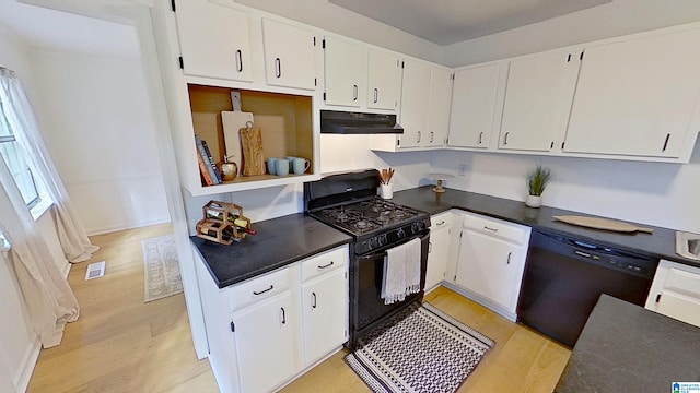 116 Pine Rock Ln, Hoover, AL 35226 - kitchen with black appliances, under cabinet range hood, light wood-style flooring, white cabinets, and dark countertops