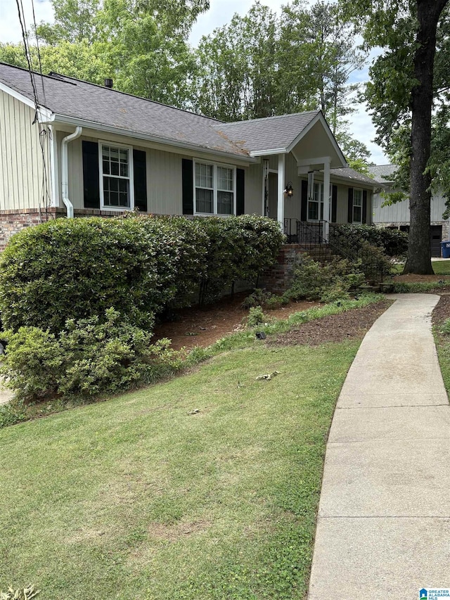 320 Cambo Ln, Hoover, AL 35244 - ranch-style home with a front yard, brick siding, and a shingled roof
