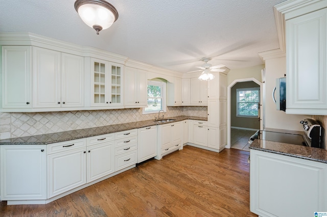 320 Cambo Ln, Hoover, AL 35244 - kitchen with stainless steel microwave, ceiling fan, a sink, light wood-style flooring, and backsplash