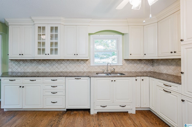 320 Cambo Ln, Hoover, AL 35244 - kitchen with a sink, wood finished floors, dark stone countertops, and glass insert cabinets