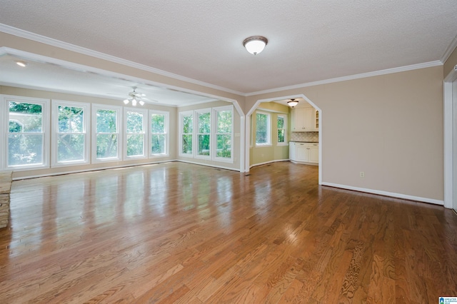 320 Cambo Ln, Hoover, AL 35244 - spare room with ceiling fan, ornamental molding, light wood finished floors, baseboards, and a textured ceiling