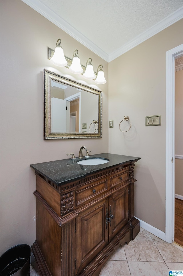 320 Cambo Ln, Hoover, AL 35244 - bathroom featuring ornamental molding, vanity, baseboards, and tile patterned flooring