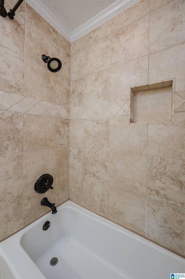 320 Cambo Ln, Hoover, AL 35244 - bathroom featuring crown molding, a textured ceiling, and bathtub / shower combination